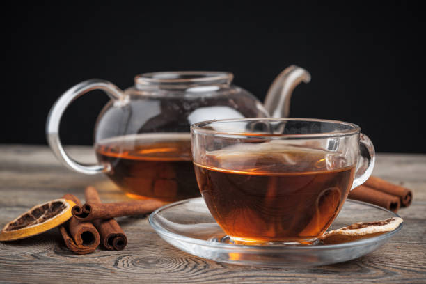 istock aromatic hot cinnamon tea on wooden table. creative photo 1270383376
