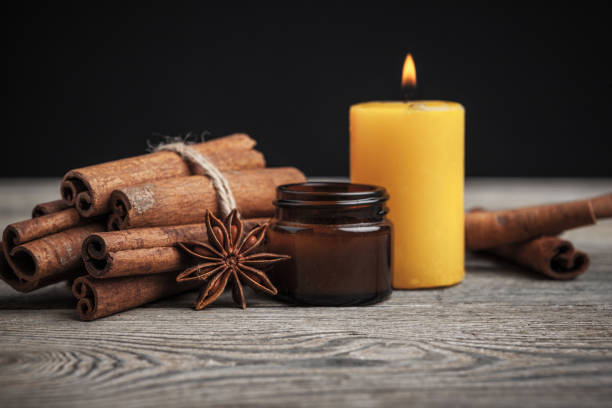 istock Cinnamon sticks on wooden background. creative photo 1270383452