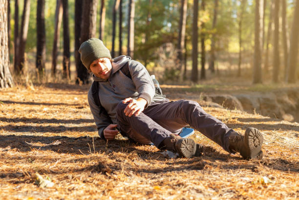 istock Man having knee pain during travel in forest 1270383536