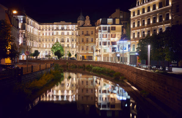 Karlovy Vary, Czechia, 8-19-2020: Photograph of the grand hotel Pupp in Karlovy Vary and its reflection in the water