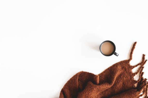 istock Autumn composition. Cup of coffee, plaid on white background. Autumn, fall concept. Flat lay, top view 1270384703