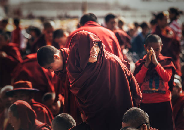 Monks and Nuns at Dalai Lama 14th Sermon Choglamsar, India - AUGUST 19: Monks and Nuns at Dalai Lama 14th Sermon on AUGUST 19, 2016 in Choglamsar, Leh region, Jammu & Kashmir, India. dalai lama stock pictures, royalty-free photos & images