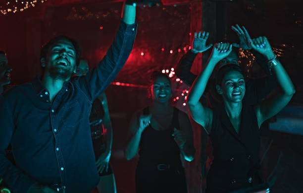 istock People enjoying at night club 1270389469