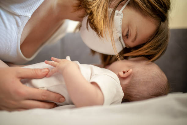 istock Mother and baby at home 1270389554