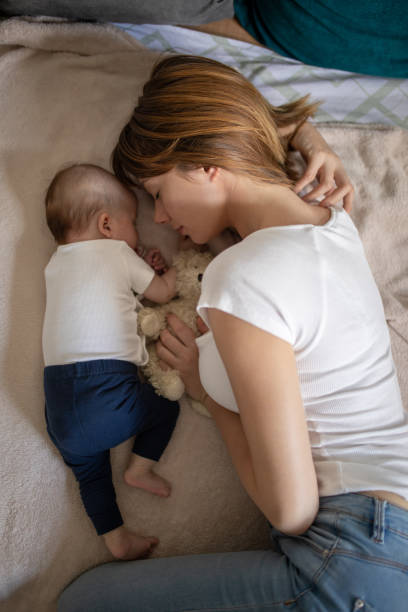 istock Mother and baby at home 1270389711