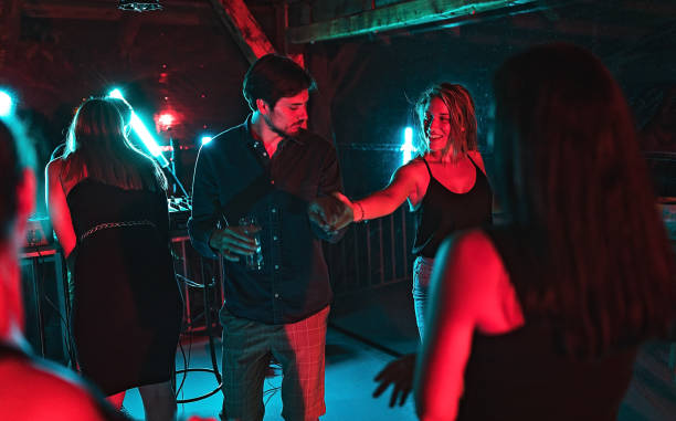 istock Couple having fun at night club 1270389931