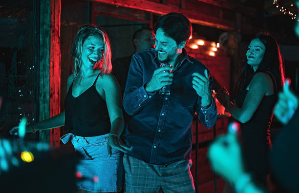istock Couple dancing in the club 1270389980