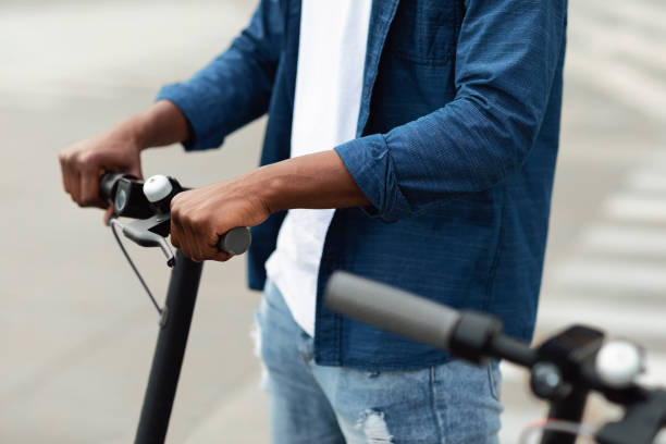 istock Guy having pleasant ride on electric kick scooter 1270392284