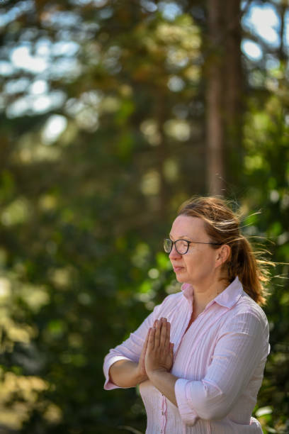 istock Woman Relaxing And Meditating In Nature 1270392443