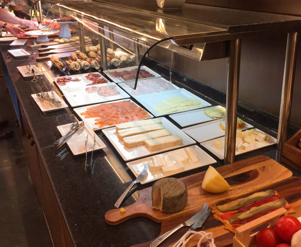 istock Cheese and meat spread buffet in hotel banquet. 1270392566
