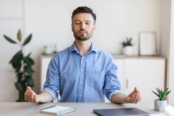 istock Office Zen. Relaxed Male Entrepreneur Meditating At Workplace, Coping With Work Stress 1270394045