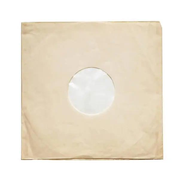 Aged yellow paper inner sleeve for vinyl LP records isolated on white background
