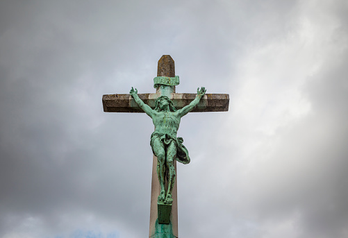Statue of Jesus Christ on the cross in a local town near Cambridge, UK