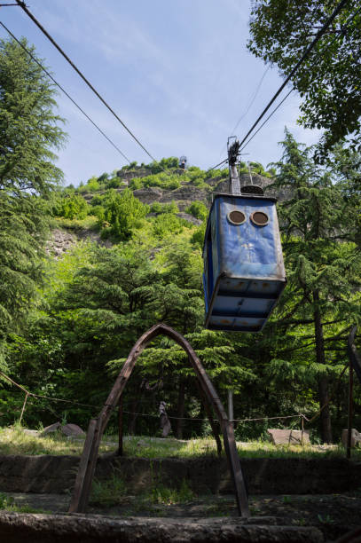 istock Cliffs and Cable Car in Mining Town Chiatura, Georgia 1270400321