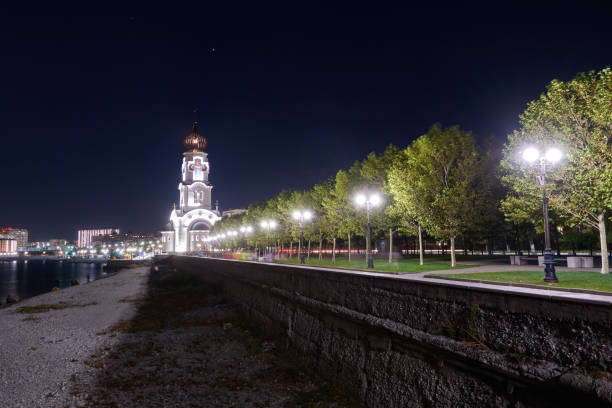 istock Church and night lit embankment 1270401755