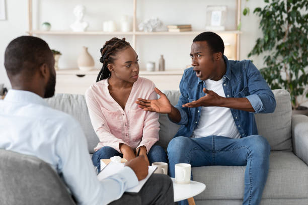 istock Anxious black man complaining about relationship problems with wife at counsellor's office 1270403345