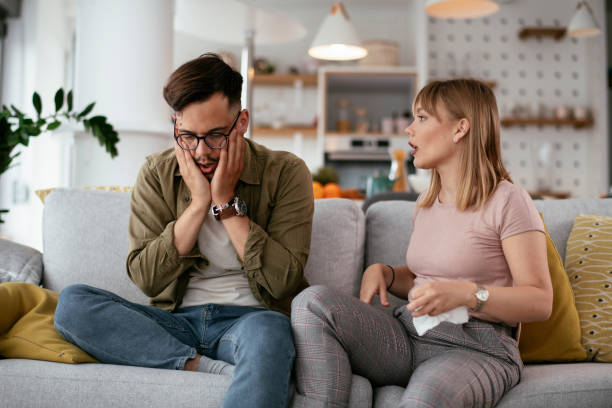 istock Boyfriend and girlfriend are arguing on the couch. 1270410135