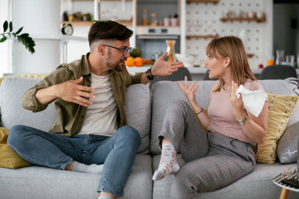 istock Boyfriend and girlfriend are arguing on the couch. 1270410241