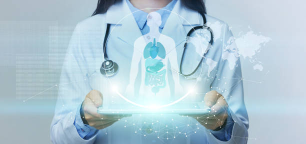 istock Doctor holding tablet with human body hologram 1270410286