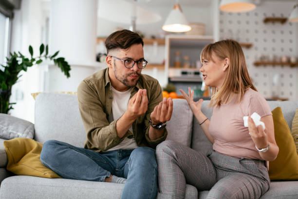 istock Boyfriend and girlfriend are arguing on the couch. 1270410989