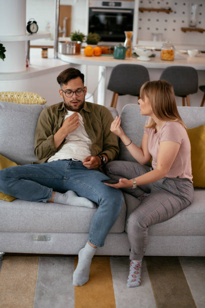 istock Boyfriend and girlfriend are arguing on the couch. 1270411548