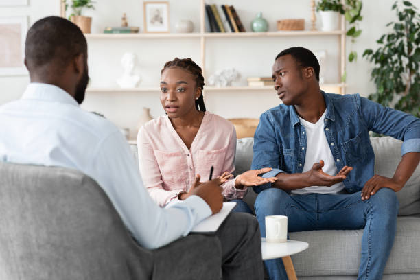 istock Marital Therapy. Irritated Black Woman Explaining To Counselor Relationship Problems With Husband 1270411716