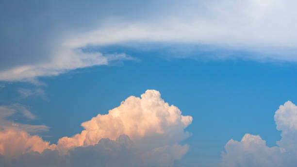 istock fluffy comulus in sunlight clouds in blues sky, colourful cloudy day. nature scenic background. 1270417093