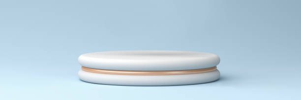 istock white podium with bronze accents on a pastel blue background, 3d render 1270418152