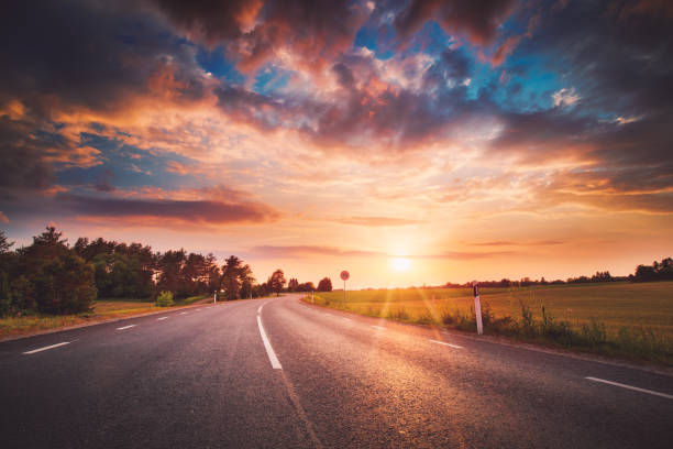 istock Asphalt road and dividing lines at sunset. 1270418846