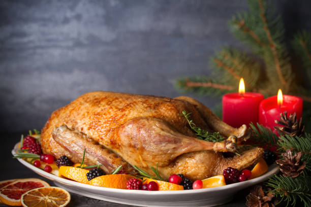 istock Whole roasted duck with oranges, berries and herbs 1270419769