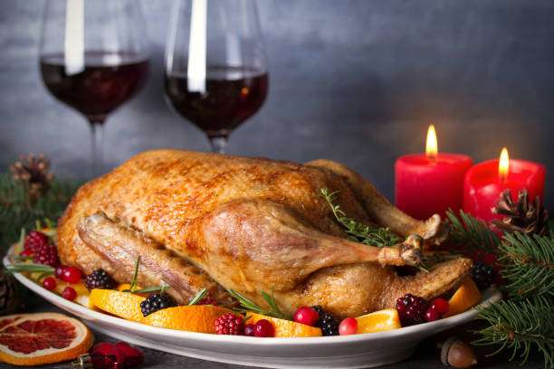 istock Whole roasted duck with oranges, berries and herbs 1270419785