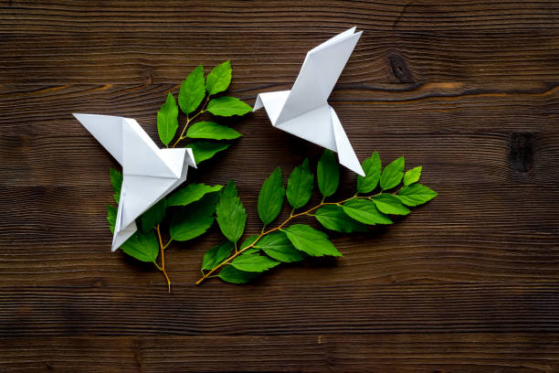istock Paper pigeons in origami technique. DIY creativity. View from above 1270420121