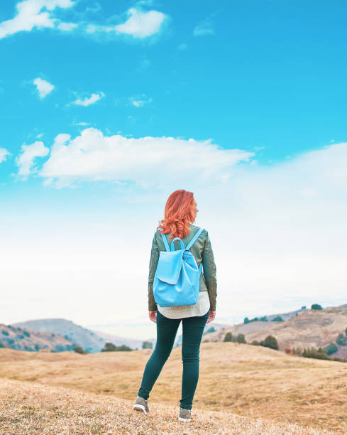 istock Beauty woman outdoors enjoying nature. 1270421576