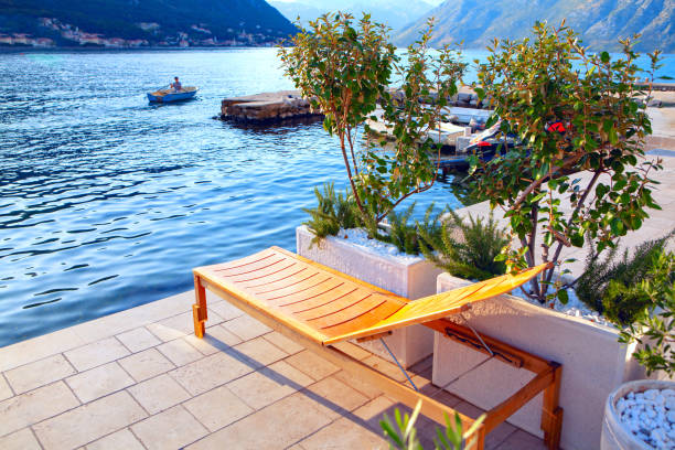 istock Chaise longue on the harbour 1270424544