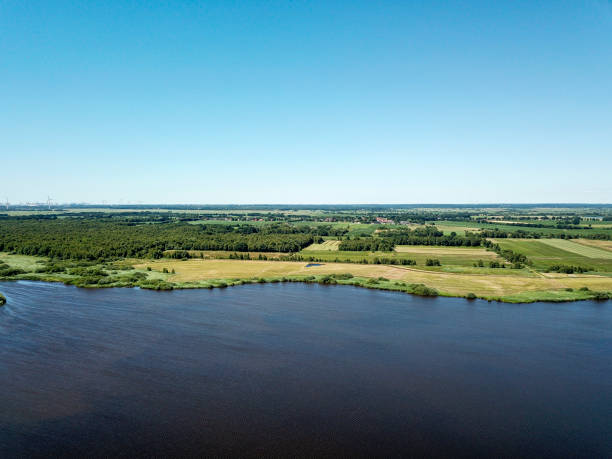 Sellstedter See lake and Ochsentriftmoor taken from above with drone. Sellstedter See lake and Ochsentriftmoor taken from above with a drone in Lower Saxony, Germany. mecklenburg lake district photos stock pictures, royalty-free photos & images
