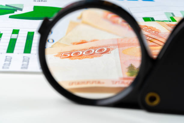 istock Magnifying Glass on the Russian Currency Rubles 1270427901