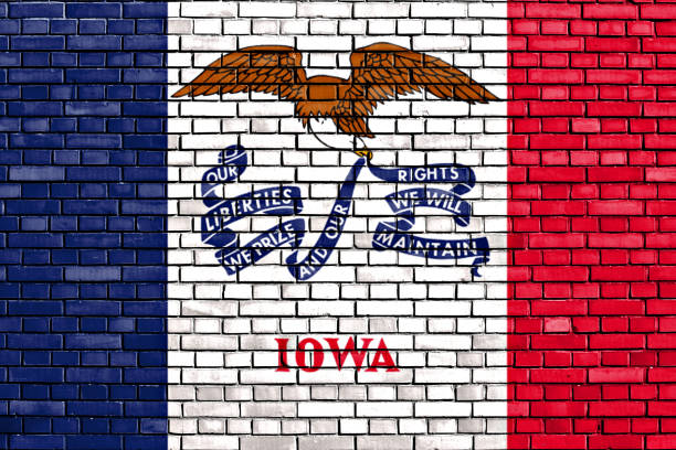 istock flag of Iowa painted on brick wall 1270428352