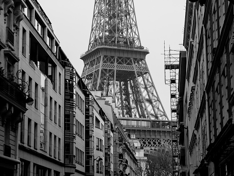 Paris street scene with Eiffel Tower in the background in France