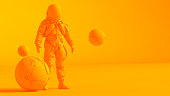 Concept stereoscopic image. Low poly earth and astronaut model isolated on orange background.