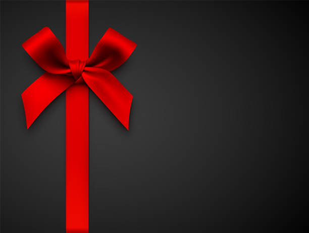 красный подарок лук с лентой на черном фоне - узел бантиком иллюстрации stock illustrations