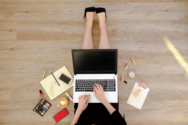 istock Lower body of female with electronics and accessories. 1270433755