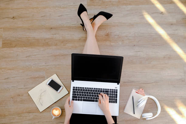 istock Lower body of female with electronics and accessories. 1270433764