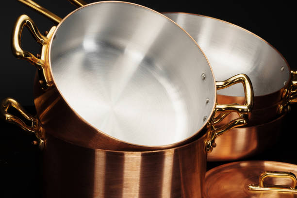 istock Set of copper cookware over dark background 1270434042