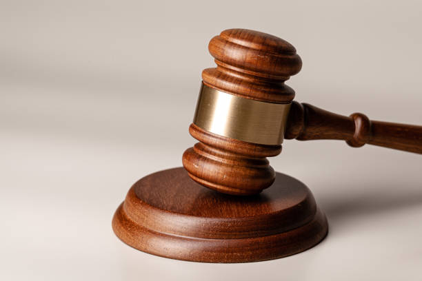 istock Wooden judges gavel on table close up 1270434519