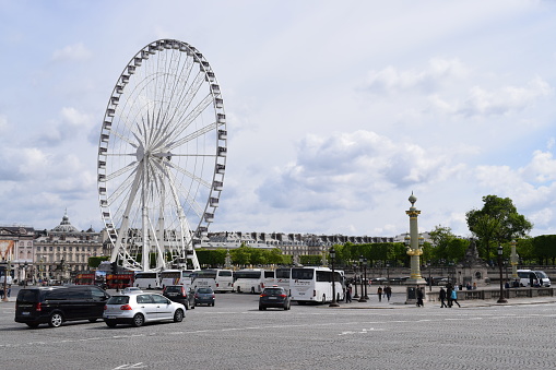 The great Ferris wheel in Place de La Concorde, near the principal attractions in Paris, Tuileries Garden and Louvre Museum