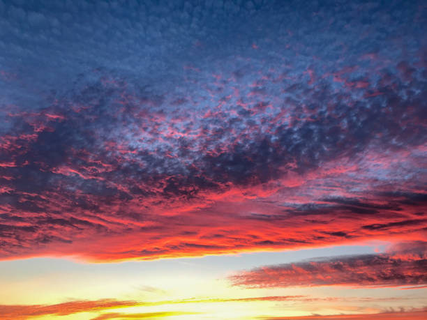 istock Spectacular magenta and orange sunset cloudscape 1270435349