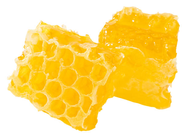 istock Honeycomb piece. Honey slice isolated on white background 1270435794
