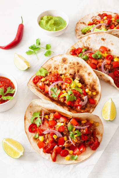 istock mexican beef and pork tacos with salsa, guacamole and vegetables 1270436160