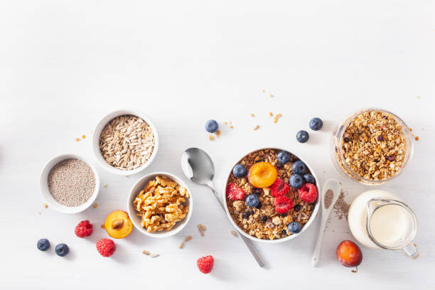 healthy granola for breakfast with berry fruit nut, plant milk