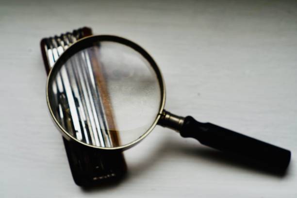 istock Pocket knife under magnifying glass 1270437796